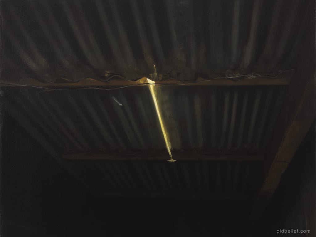 Underside of a corrugated tin roof seen from inside a dark room, a single thin shaft of light coming through a gap between the sheets